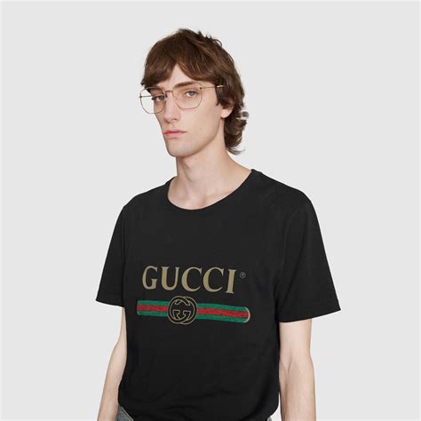 t shirt oversize délavé con logo gucci|Gucci .